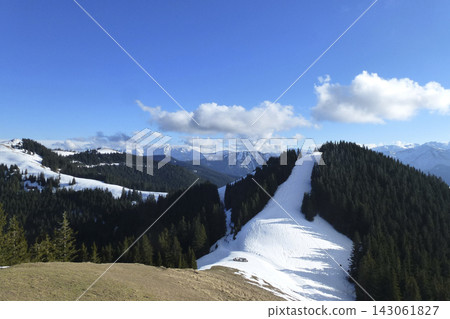 Snowy landscape at Hornle Mountain, alpine foothills in Bavaria, Germany Snowy landscape at Hornle Mountain, alpine foothills in Bavaria, Germany 143061827
