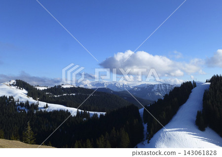 Snowy landscape at Hornle Mountain, alpine foothills in Bavaria, Germany Snowy landscape at Hornle Mountain, alpine foothills in Bavaria, Germany 143061828