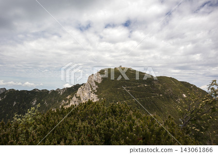 Ridge hike between Herzogstand and Heimgarten mountain in Bavaria, Germany Ridge hike between Herzogstand and Heimgarten mountain in Bavaria, Germany 143061866
