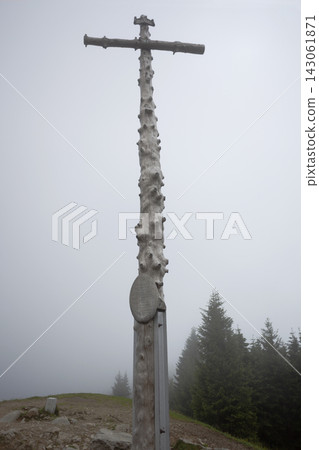 Summit cross Hinteres Hornle mountain in Bavaria, Germany Summit cross Hinteres Hornle mountain in Bavaria, Germany 143061871