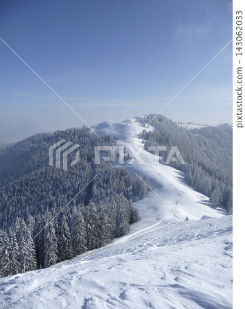 Snowy landscape at Hornle Mountain, alpine foothills in Bavaria, Germany Snowy landscape at Hornle Mountain, alpine foothills in Bavaria, Germany 143062033