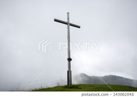 Summit cross Mittleres Hornle mountain in Bavaria, Germany Summit cross Mittleres Hornle mountain in Bavaria, Germany 143062048