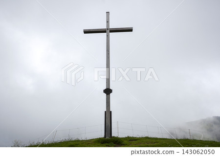 Summit cross Mittleres Hornle mountain in Bavaria, Germany Summit cross Mittleres Hornle mountain in Bavaria, Germany 143062050
