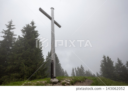 Summit cross Vorderes Hornle mountain in Bavaria, Germany Summit cross Vorderes Hornle mountain in Bavaria, Germany 143062052