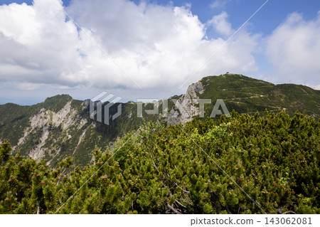 Ridge hike between Herzogstand and Heimgarten mountain in Bavaria, Germany Ridge hike between Herzogstand and Heimgarten mountain in Bavaria, Germany 143062081