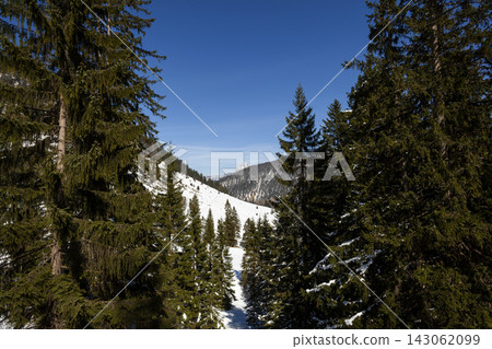Snowy landscape at lake Soinsee, Rotwand mountain, in Bavaria, Germany 143062099