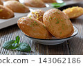 Delicious golden fried madeleines garnished with mint and lemon zest. 143062186