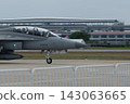 Supersonic fighter jets move across the airport 143063665