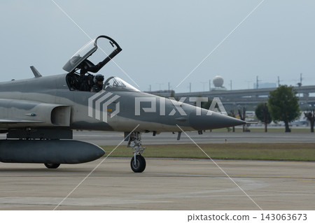 Fighter plane on abstract technology background Fighter plane on abstract technology background 143063673