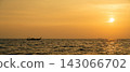 The small long-tailed boats of the Phi Phi Islands and the golden sea 143066702