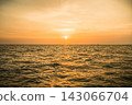 The vast ocean and orange sunset near the Phi Phi Islands 143066704