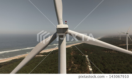 Wind turbine aerial view near beach Wind turbine aerial view near beach 143067910