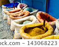 Colorful spice sacks in market stall 143068223
