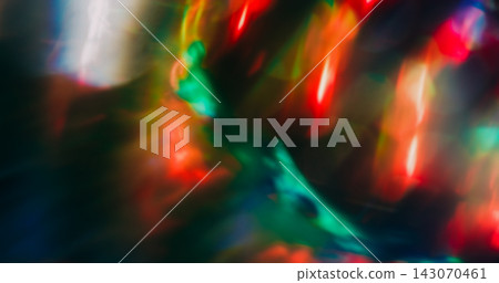 Bokeh ray. Light art. Defocused red blue multicolor radiant visual glisten optical neon glimmer texture circle on dark black background. Bokeh ray. Light art. Defocused red blue multicolor radiant visual glisten optical neon glimmer texture circle on dark black background. 143070461