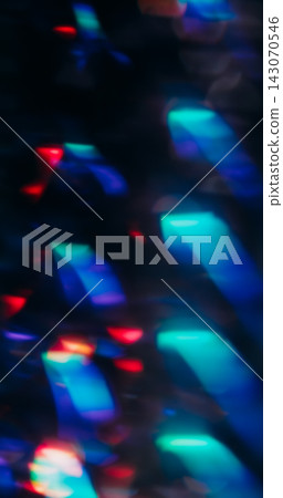 Bokeh art. Abstract light. Defocused red blue purple color radiant glisten texture optical neon flash on illuminated dark black background. Bokeh art. Abstract light. Defocused red blue purple color radiant glisten texture optical neon flash on illuminated dark black background. 143070546
