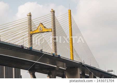 Yellow Cable-Stayed Bridge Tower Framed from Below in Bangkok Yellow Cable-Stayed Bridge Tower Framed from Below in Bangkok 143071704