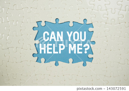 Jigsaw puzzle with a missing piece with "Can You Help Me?" on blue background Jigsaw puzzle with a missing piece with "Can You Help Me?" on blue background 143072591