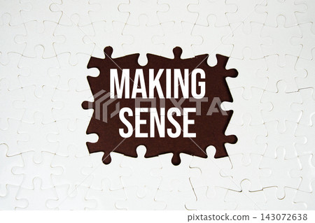 Jigsaw puzzle with a missing piece with "Making Sense" Jigsaw puzzle with a missing piece with "Making Sense" 143072638