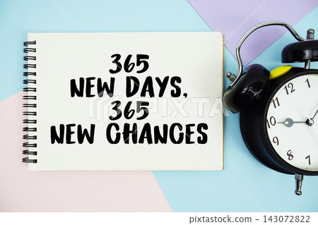 365 New Days, 365 New Chances text written on notepad with alarm clock flat lay on multicolor pastel background 365 New Days, 365 New Chances text written on notepad with alarm clock flat lay on multicolor pastel background 143072822