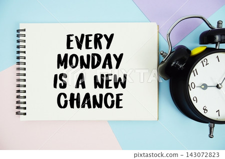 Every Monday Is A New Chance text written on notepad with alarm clock flat lay on multicolor pastel background Every Monday Is A New Chance text written on notepad with alarm clock flat lay on multicolor pastel background 143072823