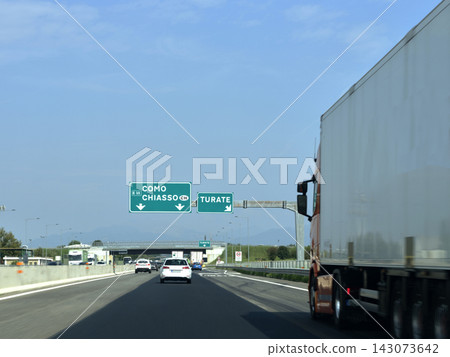 Driving on Italian autostrada with trucks Driving on Italian autostrada with trucks 143073642