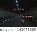 Swiss road tunnel with moving vehicles 143073665
