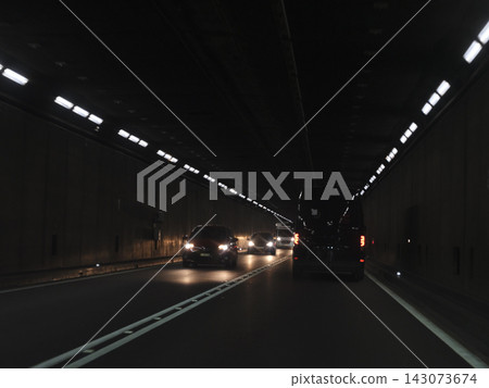 Traffic in gotthard road tunnel, switzerland Traffic in gotthard road tunnel, switzerland 143073674