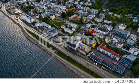 Aerial view of Fjelltun coastal area with residential buildings and harbor, Alesund Norway Aerial view of Fjelltun coastal area with residential buildings and harbor, Alesund Norway 143074008