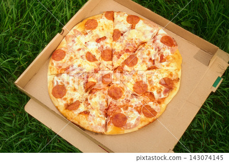 Morning breakfast pizza delivered in box for summer outdoor picnic 143074145