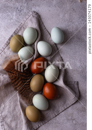 Farm blue, green and brown chicken eggs Farm blue, green and brown chicken eggs 143074179
