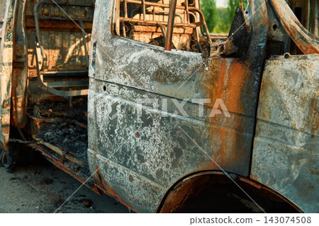 Charred Car Interior Inside Burned Delivery Van with Metal Seat Frames Charred Car Interior Inside Burned Delivery Van with Metal Seat Frames 143074508