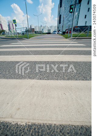 Pedestrian Crosswalk View directly on City Street Pedestrian Crosswalk View directly on City Street 143074509