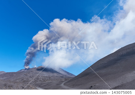 Impressive eruption of Mount Etna in Sicily, expelling a large column of dark ash Impressive eruption of Mount Etna in Sicily, expelling a large column of dark ash 143075005