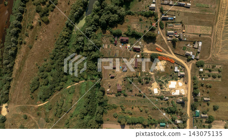 Aerial View of Rural Landscape with River and Settlement in Belarus Aerial View of Rural Landscape with River and Settlement in Belarus 143075135