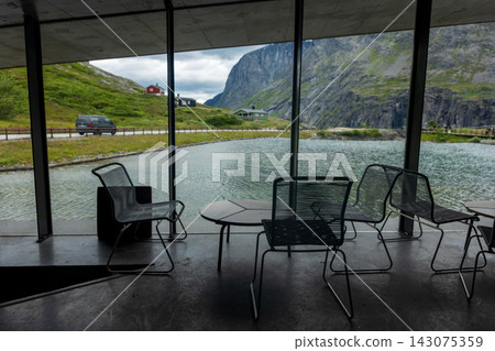 Interior view from modern pavilion overlooking fjord valley with mountains, Norway Interior view from modern pavilion overlooking fjord valley with mountains, Norway 143075359