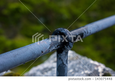Close-up of corroded metal pipe joint with black oxidation, Norway Close-up of corroded metal pipe joint with black oxidation, Norway 143075448