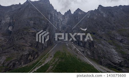 Aerial view of mountain valley with columnar basalt cliffs, Eidet, Rauma, Norway Aerial view of mountain valley with columnar basalt cliffs, Eidet, Rauma, Norway 143075600