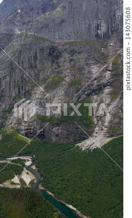 Aerial view of Rauma River valley with columnar basalt cliffs and coniferous forest, Eidet, Norway Aerial view of Rauma River valley with columnar basalt cliffs and coniferous forest, Eidet, Norway 143075608