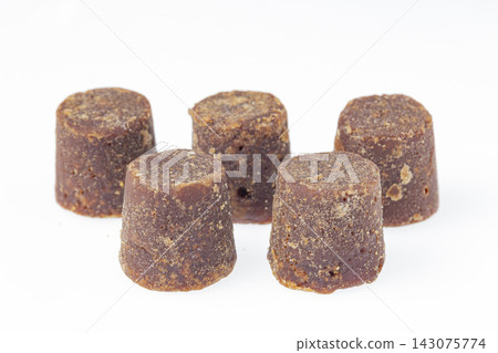 Piloncillo bars, a product of sugar cane Piloncillo bars, a product of sugar cane 143075774