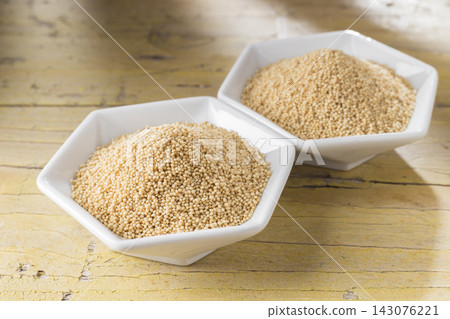 amaranth beans in bowl, on rustic wooden background amaranth beans in bowl, on rustic wooden background 143076221