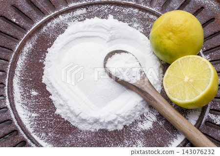 lemon and baking soda on the table lemon and baking soda on the table 143076232