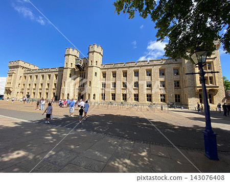 Waterloo Block, a historic building at the Tower of London, a World Heritage Site under a blue sky. 143076408