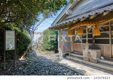 Hegura Island: Shrine building and sacred rope, approach to the sea Hegura Island: Shrine building and sacred rope, approach to the sea 143076825