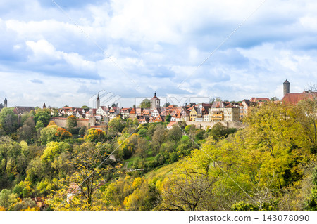 Panoramic view of Rothenburg ob der Tauber old town with city wall and medieval towers in Germany Panoramic view of Rothenburg ob der Tauber old town with city wall and medieval towers in Germany 143078090