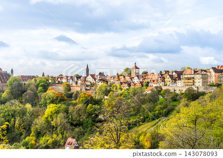 Panoramic view of Rothenburg ob der Tauber old town with city wall and medieval towers in Germany Panoramic view of Rothenburg ob der Tauber old town with city wall and medieval towers in Germany 143078093