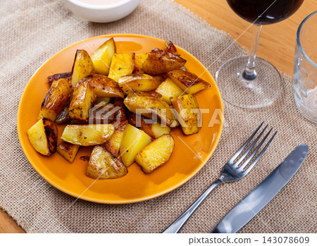 Patatas Bravas, popular Spanish delicacy Patatas Bravas, popular Spanish delicacy 143078609