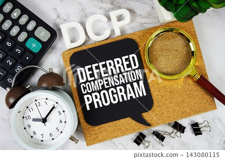 DCP - Deferred Compensation Program acronym with calculator, alarm clock and magnifying glass, Business and Financial concept background 143080115