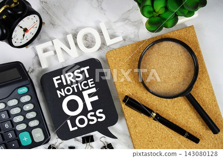 FNOL - First Notice Of Loss acronym with calculator, alarm clock and magnifying glass, Business and Financial concept background FNOL - First Notice Of Loss acronym with calculator, alarm clock and magnifying glass, Business and Financial concept background 143080128
