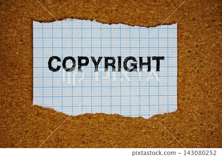 Copyright text written on ripped paper piece Copyright text written on ripped paper piece 143080252