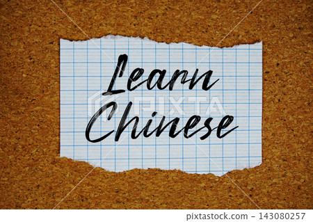 Learn Chinese text written on ripped paper piece Learn Chinese text written on ripped paper piece 143080257